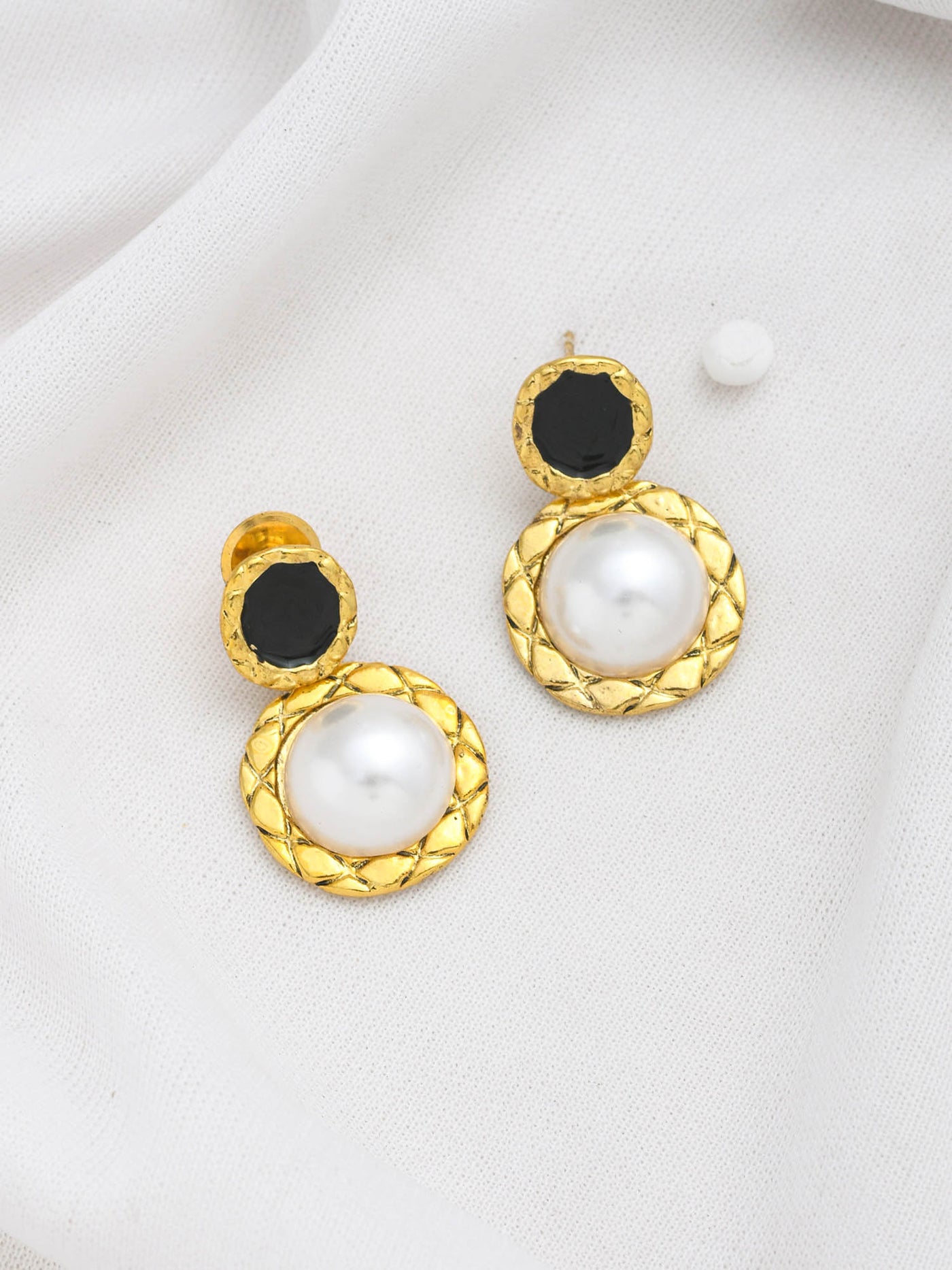 PEARL WITH BLACK ENAMEL STUDS