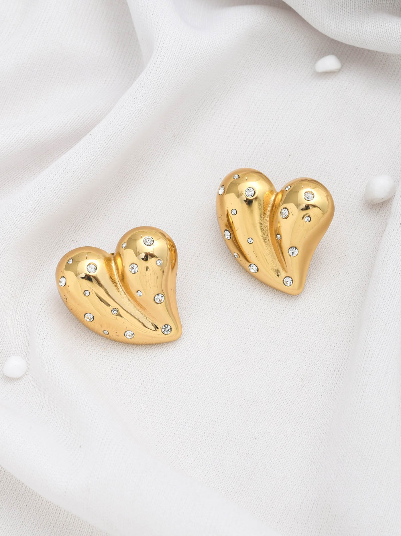 BOLD CZ HEART STUDS